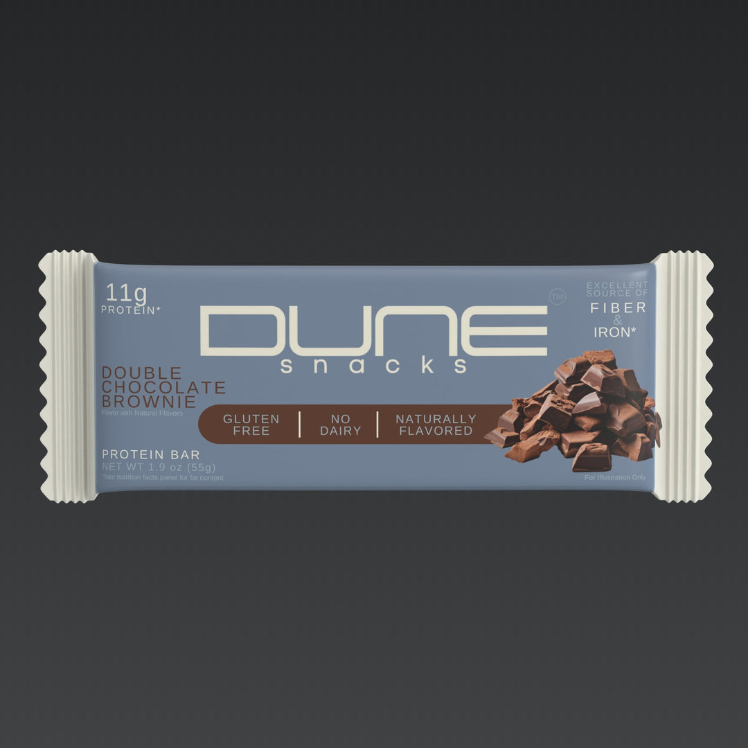 Dune Snacks Double Chocolate Brownie protein bar on a dark background